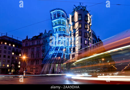 The Petrin lookout tower and the Dancing House (photo) in Prague was lit in the turquoise colour of the UNICEF United Nations Children's Fund tonight, on Wednesday, November 20, 2019, to join the celebration of the 30th anniversary of the UN Convention on the Rights of the Child's adoption. (CTK Photo/Vit Simanek) Stock Photo