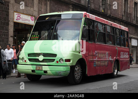 Passengers board Microbus in Mexico City street Stock Photo