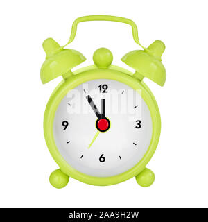 Alarm clock showing five minutes to twelve Stock Photo