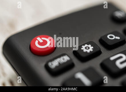 Smart tv remote control with power button. Concept of entertainment, fun, news. Stock Photo