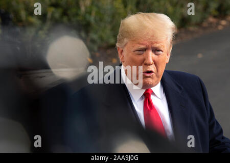 United States President Donald J. Trump speaks to the media on the South Lawn of the White House in Washington, DC, U.S., on Wednesday, November 20, 2019, as he departs for a day trip to Austin, Texas. Credit: Stefani Reynolds/CNP /MediaPunch Stock Photo