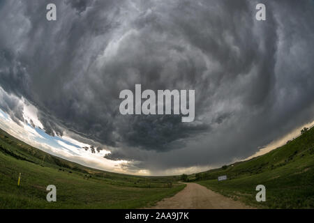 Rotation in the clouds of a supercell thunderstorm over the plains of eastern Wyoming, USA. Fisheye view.