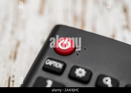 Smart tv remote control with power button. Concept of entertainment, fun, news. Stock Photo