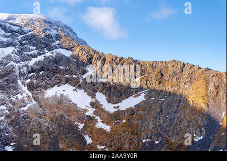 English Lake District mountain landscape Sharp Edge in ice and  winter snow from Scales Fell on Blencathra one of the  North East Lakeland Fells Stock Photo