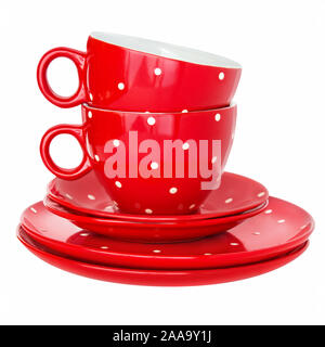 Set of dishes two red cups and plates Stock Photo