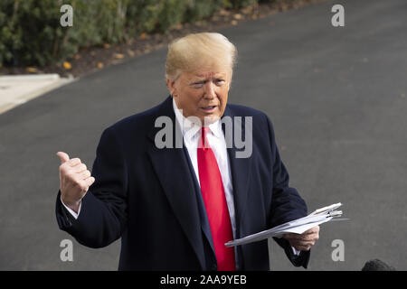 November 20, 2019, Washington, District of Columbia, USA: United States President Donald J. Trump speaks to the media on the South Lawn of the White House in Washington D.C., U.S., on Wednesday, November 20, 2019, as he departs for a day trip to Austin, Texas. (Credit Image: © Stefani Reynolds/CNP via ZUMA Wire) Stock Photo