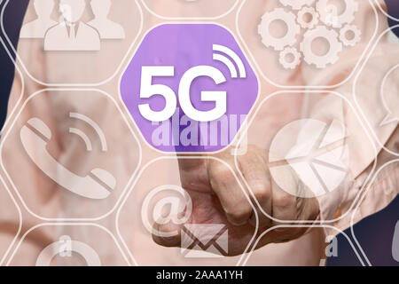 Businessman chooses 5G Wireless connection on the touch screen network connections Stock Photo