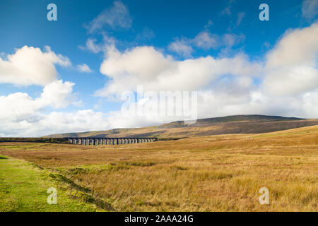 Ribblehead Viaduct with Whernside Hill in the background in the Yorkshire Dales in England Stock Photo