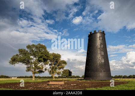 The Black Mill, an old brick windmill painted with black tar with no sails, is a landmark on Beverley Westwood, Beverley, East Yorkshire, England Stock Photo