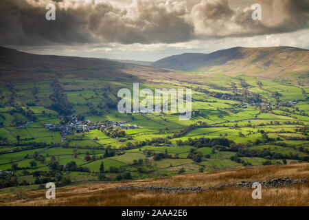 The village of Dent in the valley of Dentdale with Calf Top hill in the background. Stock Photo