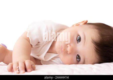 Baby Lying On The Bed Side Way Clean Baby Face And Close Up Eyes Stock Photo Alamy