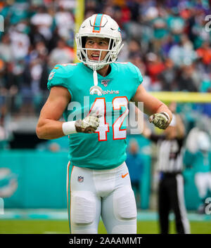 Miami Dolphins running back Patrick Cobbs (38) picks up 30 yards on this  catch against the Baltimore Ravens in first quarter action in the NFL AFC  wildcard game at Dolphin Stadium in