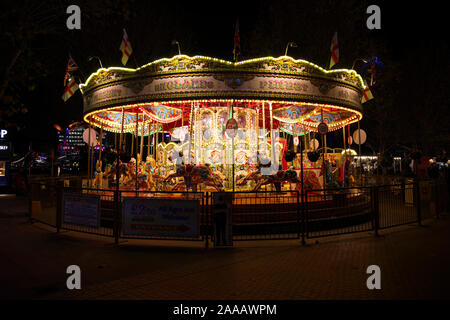 A Carousel at Southbank Christmas market in central London at night Stock Photo