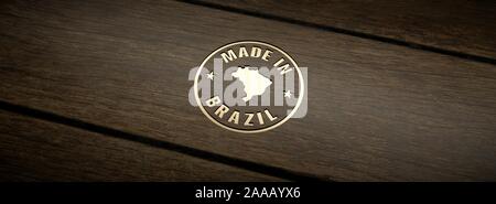 Stamp made in Brazil, engraved in wood with gold inlays. Stock Photo