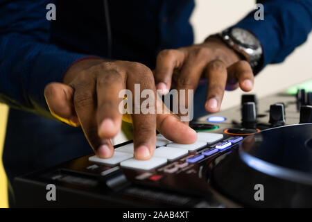 Beat machine device for electronic music composer.Techno dj play and remix musical tracks with modern drum machine.Professional sound recording studio Stock Photo