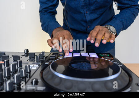Beat machine device for electronic music composer.Techno dj play and remix musical tracks with modern drum machine.Professional sound recording studio Stock Photo