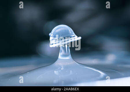 Water drop collision form metallic background Stock Photo