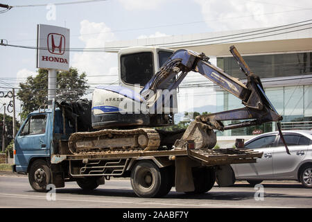 Chiangmai, Thailand -  October 29 2019: Private Mitsubishi backhoe on truck. On road no.1001, 8 km from Chiangmai city. Stock Photo
