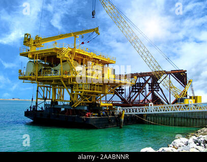 Offshore oil rig platform during construction site in the harbor yard. Stock Photo