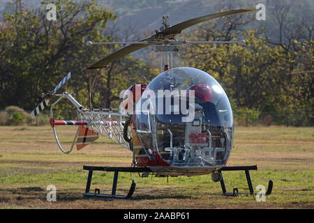 Sylmar, CA / USA - Nov. 9, 2019: A 1950 Bell 47D-1 helicopter is shown on display at the annual American Heroes Air Show in Los Angeles. Stock Photo