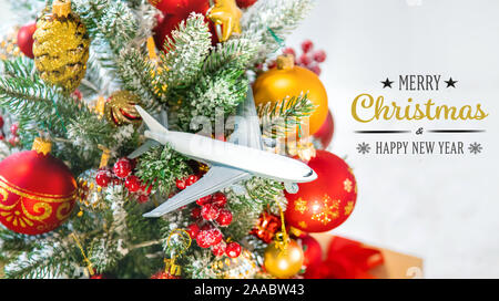 https://l450v.alamy.com/450v/2aabw43/christmas-background-with-airplane-travel-concept-for-the-holidays-selective-focus-new-year-2aabw43.jpg