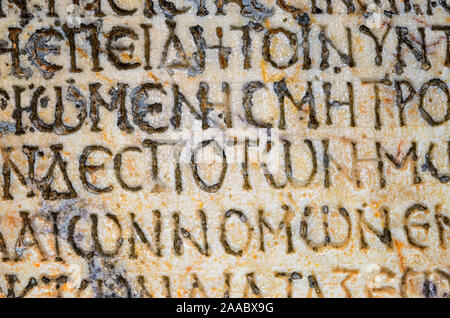Old greek scriptures in Ephesus Turkey - archeology background Stock Photo