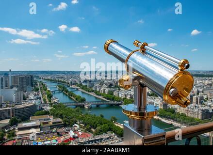 Telescope on the Eiffel Tower, view of the city with river Seine, Paris, France Stock Photo