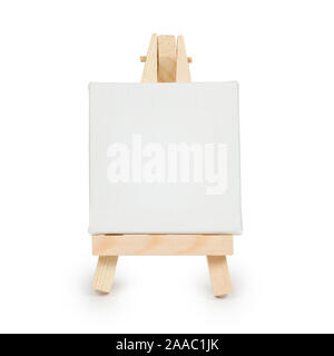 Miniature easel with blank canvas isolated on a white background. Front view Stock Photo