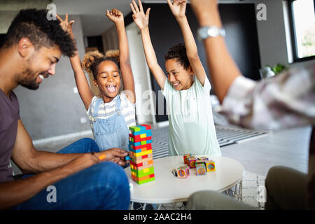 Happy black family having fun times at home Stock Photo