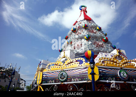 ANTIPOLO CITY, PHILIPPINES – NOVEMBER 20, 2019: Tall and colorful Christmas tree at an outdoor public park. Stock Photo