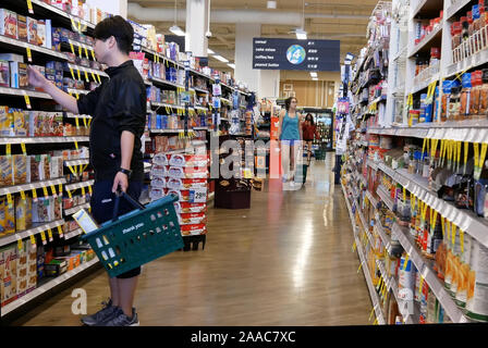 Burnaby, BC, Canada - May 09, 2019 : Motion of people buying cream for coffee inside price smart foods store Stock Photo