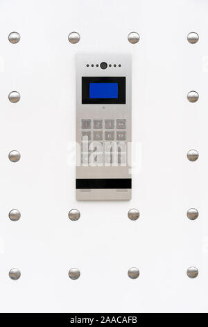 safety in modern residential buildings. electronic lock at the entrance to a residential building. Stock Photo