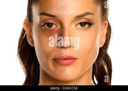 Comparison portrait of young woman before and after makeup on white background Stock Photo