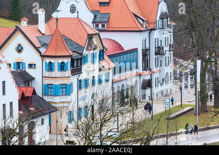 Fussen, Germany - December 27, 2016: Beautiful painted traditional bavarian houses aerial street view near Neuschwanstein and german alps in Bavaria Stock Photo