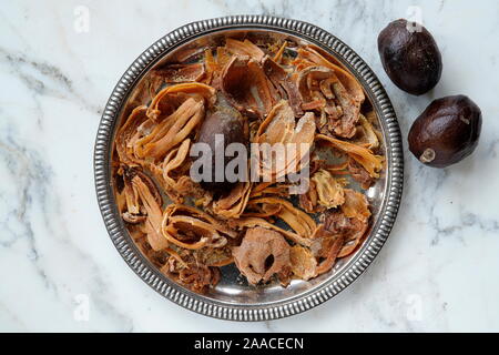 Nutmegs (Myristica fragrans) whole and Mace all over, India, Asia Stock Photo