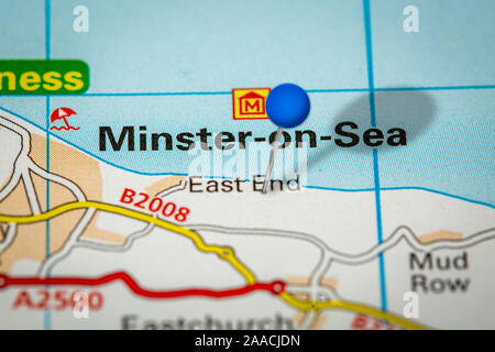 Blue Map Pin on Paper Map Showing Minster on Sea Stock Photo