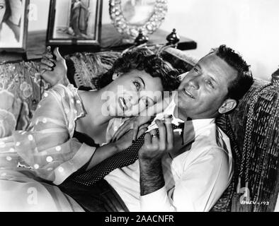 GLORIA SWANSON as Norma Desmond and WILLIAM HOLDEN as Joe Gillis in SUNSET BOULEVARD 1950 director BILLY WILDER writers CHARLES BRACKETT BILLY WILDER and D. M. MARSHMAN Jr Costume design EDITH HEAD Paramount Pictures Stock Photo