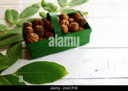 The picture shows walnuts in a basket Stock Photo