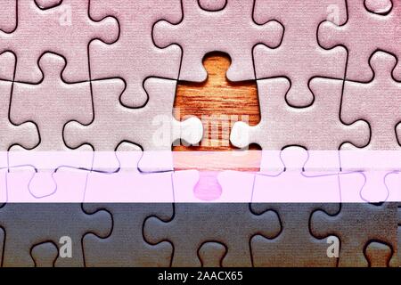 Jigsaw puzzle background, almost done Stock Photo
