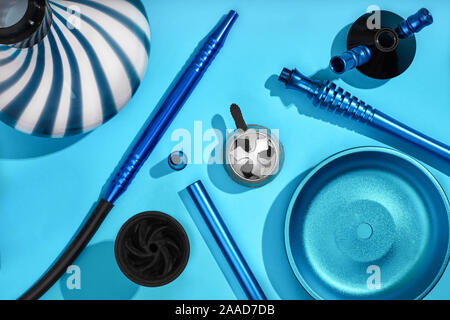 Top view of Hookah parts on light blue background Stock Photo
