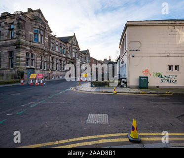 Leith, Edinburgh, Scotland, United Kingdom. 21st Nov, 2019. Trams to Newhaven work starts: Constitution Street is closed to traffic for the next 2-3 years to build the extension for Edinburgh's tram line from to Newhaven, with 8 more stops over 2.91 miles. Barriers are put up along the road. The work is being undertaken by SFN (Sacyr Farrans Neopul) and MUS (Morrison Utility Services). A closed road barrier with traffic cones Stock Photo