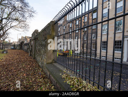 Leith, Edinburgh, Scotland, United Kingdom. 21st Nov, 2019. Trams to Newhaven work starts: Constitution Street is closed to traffic for the next 2-3 years to build the extension for Edinburgh's tram line from to Newhaven, with 8 more stops over 2.91 miles. The A-listed wall of South Leith Parish Church graveyard will be rebuilt and 200 bodies in Medieval graves removed Stock Photo