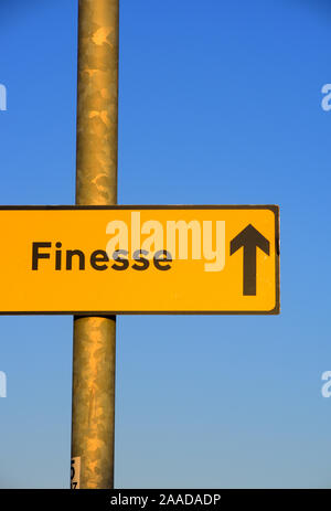 roadside roadsign arrow pointing to finesse project Stock Photo