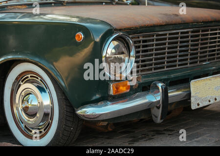 Old broken and rusty USSR times VAZ Car in summer day Stock Photo