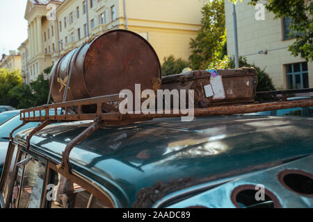 Old broken and rusty USSR times VAZ Car in summer day Stock Photo