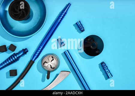 Top view of Hookah parts on light blue background Stock Photo