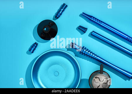 Top view of Hookah parts on light blue background Stock Photo