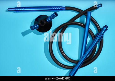 Top view of Hookah parts on light blue background Stock Photo