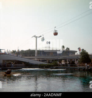Vintage September 1972 photograph, the monorail, Skyliner, and Carousel of Progress at Disneyland theme park in Anaheim, California. SOURCE: ORIGINAL 35mm TRANSPARENCY Stock Photo
