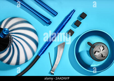 Top view of Hookah parts on light blue background Stock Photo